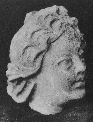Head of god Brahma or a young brahman