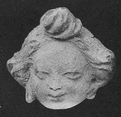Head of god Brahma or a young brahman