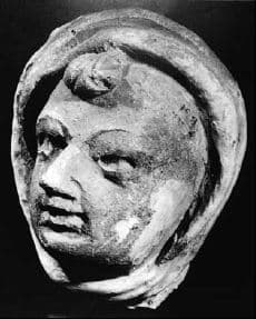 Figure in Stucco: Head of Monk Bhikṣu, Novice with a lock of hair, Deh-i Ghoundi, Hadda
