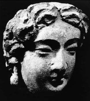 Figure in Stucco: Head of a young donor, Tapa-i Kafarihā, Hadda