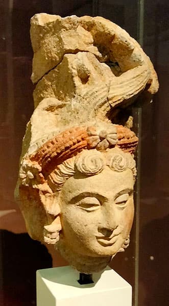 Figure in Stone: Yakṣi at the tree, Tapa-i Kafarihā, Hadda
