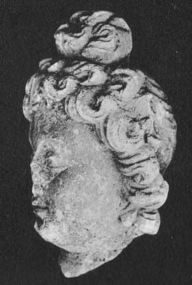 Figure in Stucco: Head of god Brahma or a young brahman, Tapa-i Kafarihā, Hadda