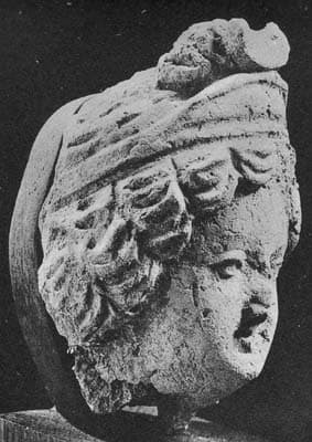 Figure in Stucco: Head of a deity, probably the god Indra, Tapa-i Kafarihā, Hadda