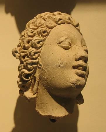 Figure in Stucco: Head of Brahma or young brahman, Tapa Kalān, Hadda