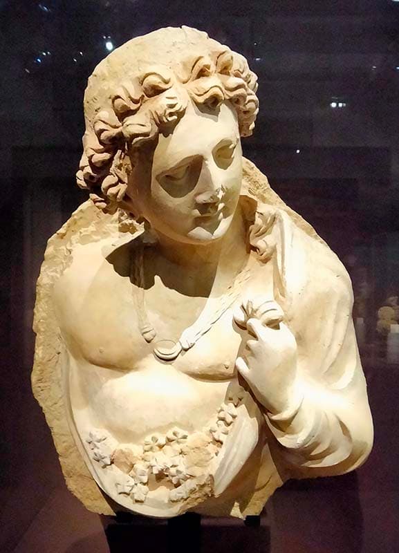 Bust of Genius with Flowers