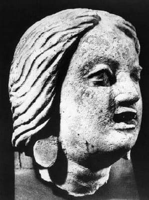 Figure in Stucco: Head of a female donor, Tapa Kalān, Hadda