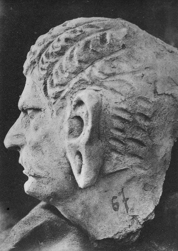Figure in Stucco: Head of Warrior, Tapa Kalān, Hadda