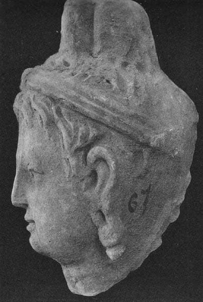 Figure in Stucco: Head of goddess Hāritī topped by the City, Tapa Kalān, Hadda