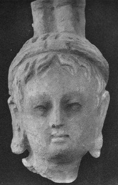 Head of goddess Hāritī topped by the City